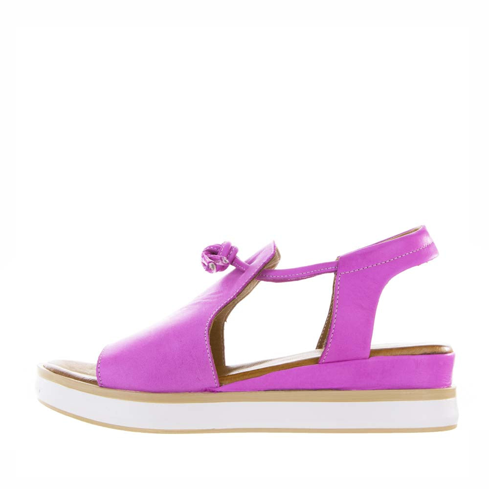 Le Sansa Hide Bead sandals featuring leather straps and decorative beads, showcased on a neutral background.