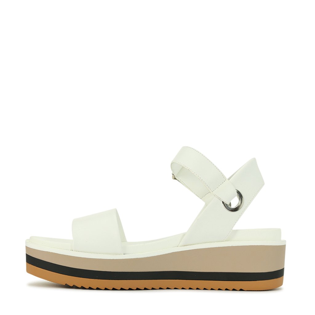 LOS CABOS ZITA white sandals with open toe design and ankle strap, featuring a sleek, minimalist style.