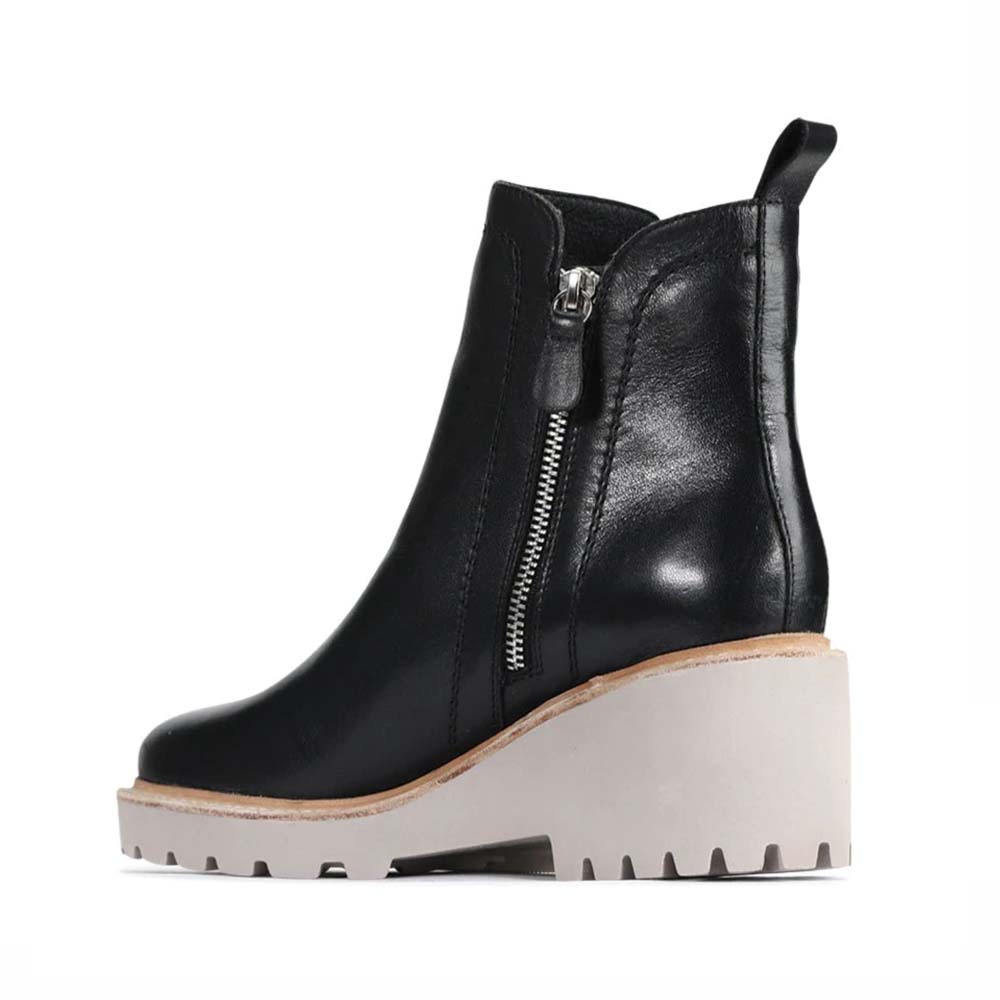 Eos Parson Black boots with sleek leather design, rounded toe, and low heel, showcasing stylish footwear for casual or formal wear.