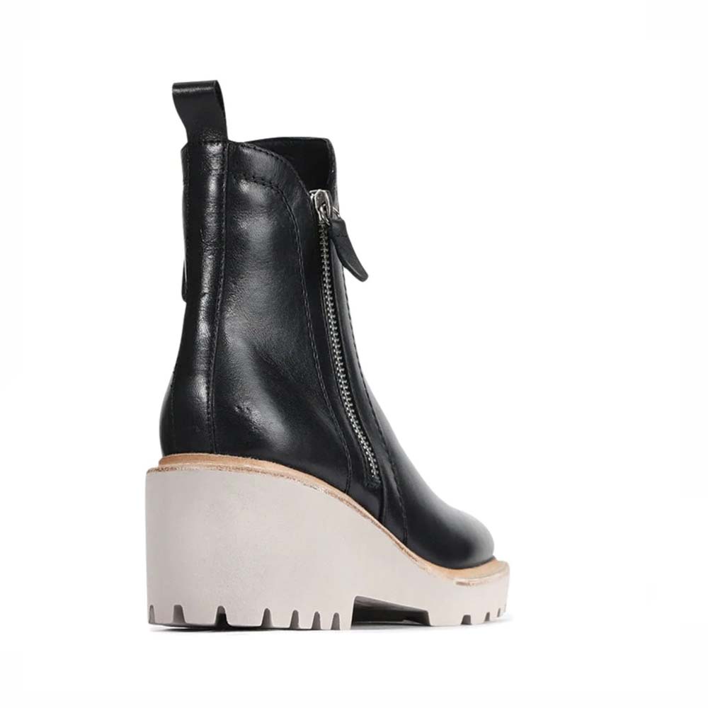 Eos Parson Black boots featuring sleek leather design and ankle-high style, perfect for casual or stylish outfits.